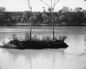 Man-Made Sandstone Cairn, built 1860s, on the Submerged Seventeen-Mile Rocks. Sev Mile Rocks BCC-B54-16845